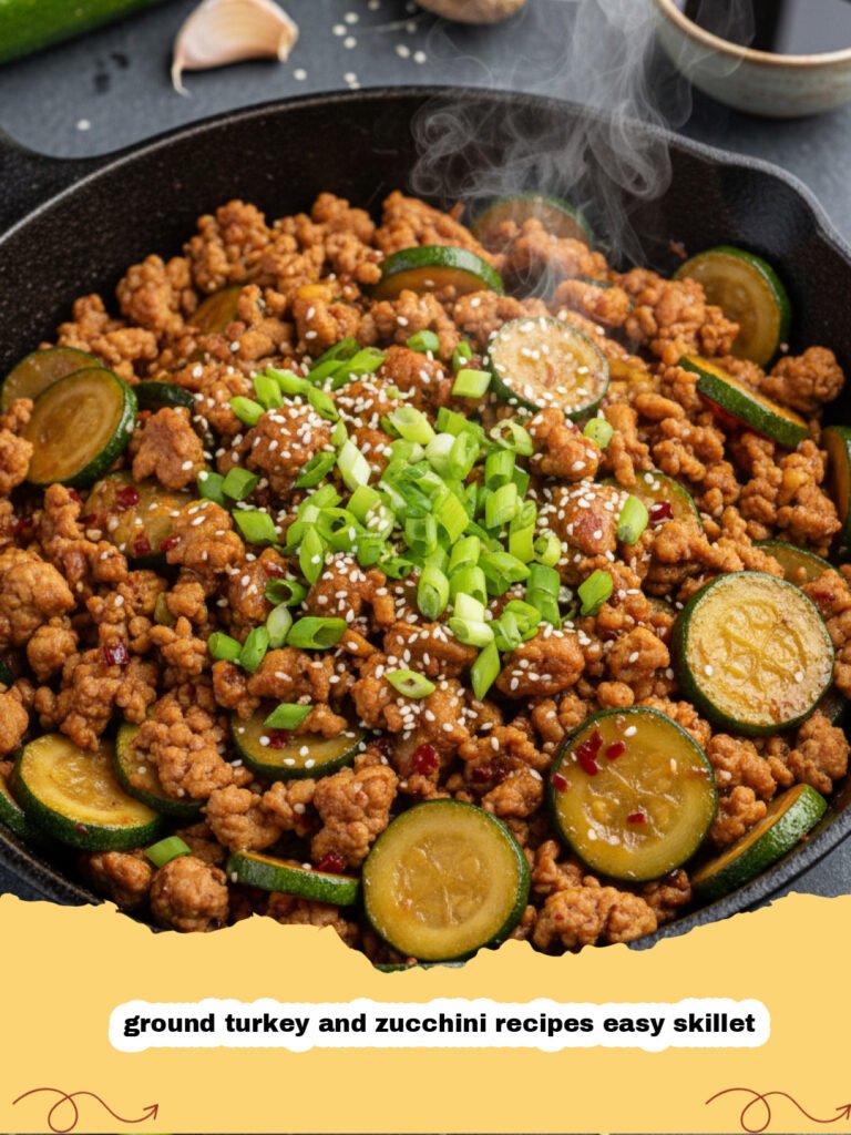 ground turkey and zucchini recipes easy skillet - A close up of a ground turkey and zucchini skillet with garlic and onions