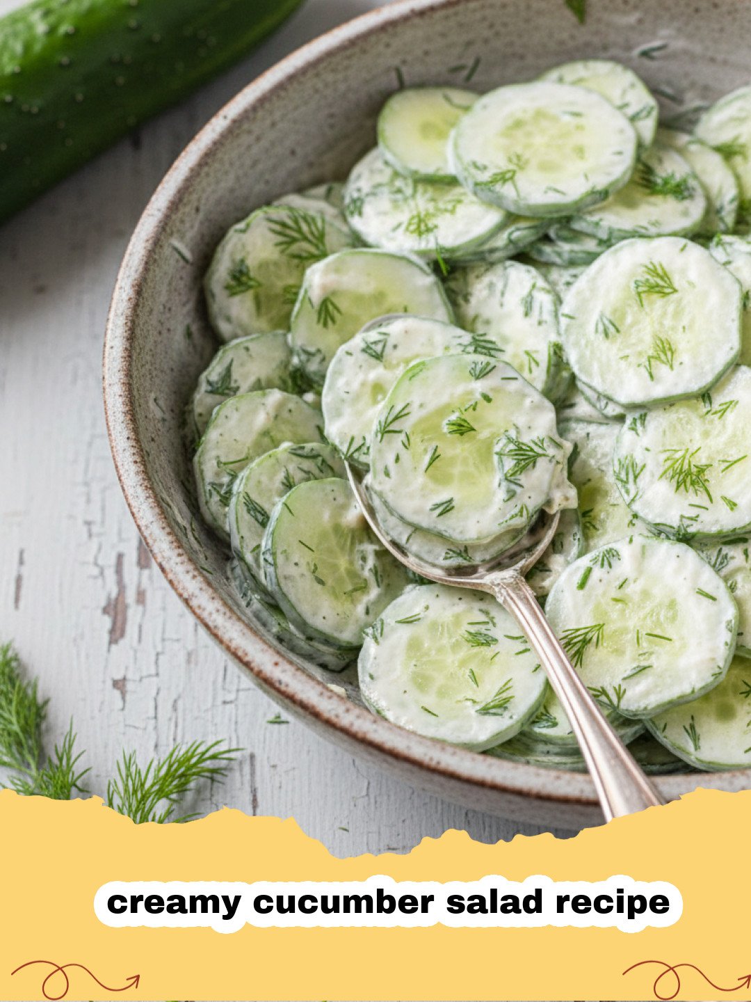 creamy cucumber salad recipe - A bowl of creamy cucumber salad with fresh dill and red onions