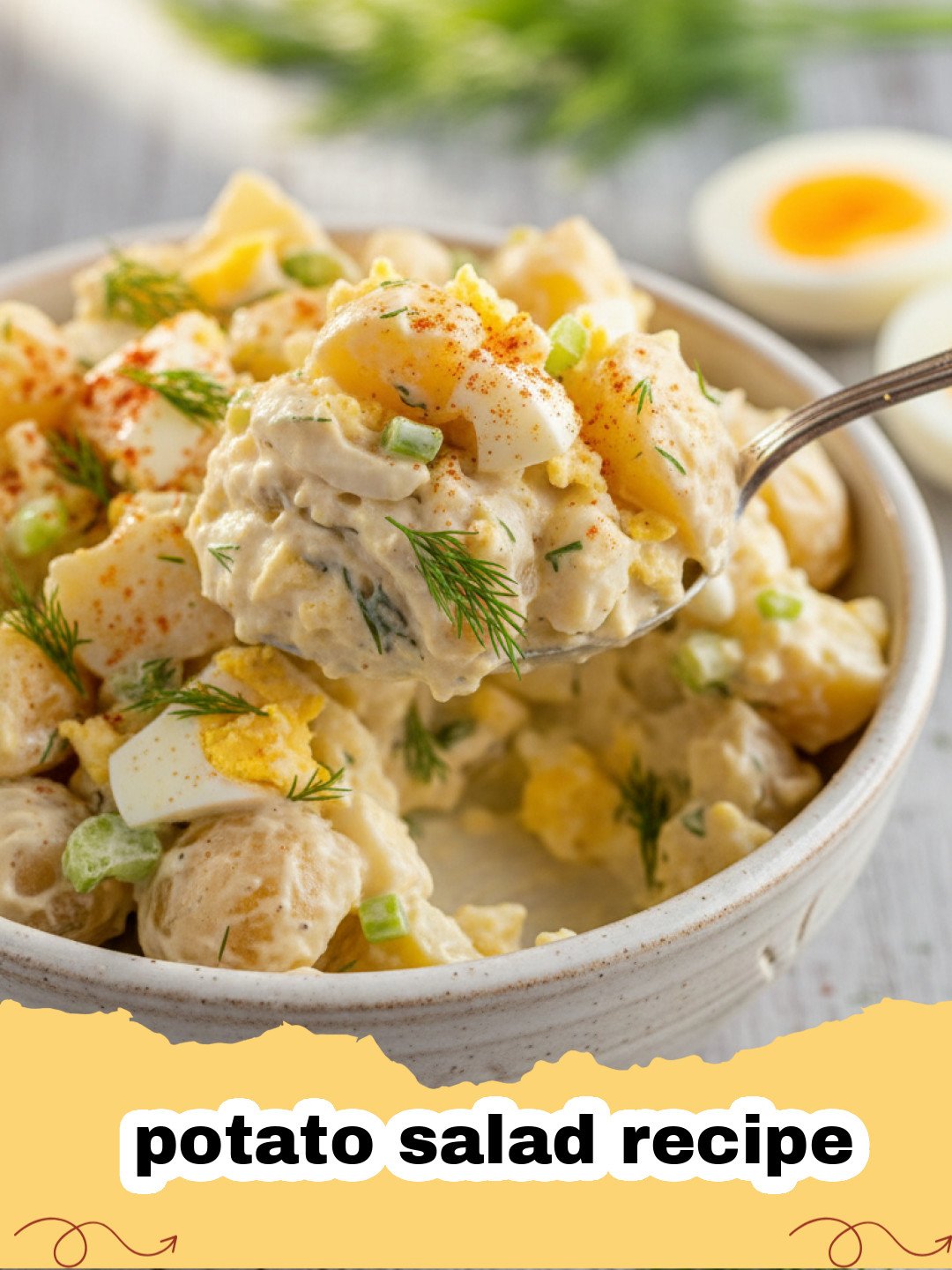 potato salad recipe - A bowl of creamy Southern potato salad topped with fresh dill and paprika