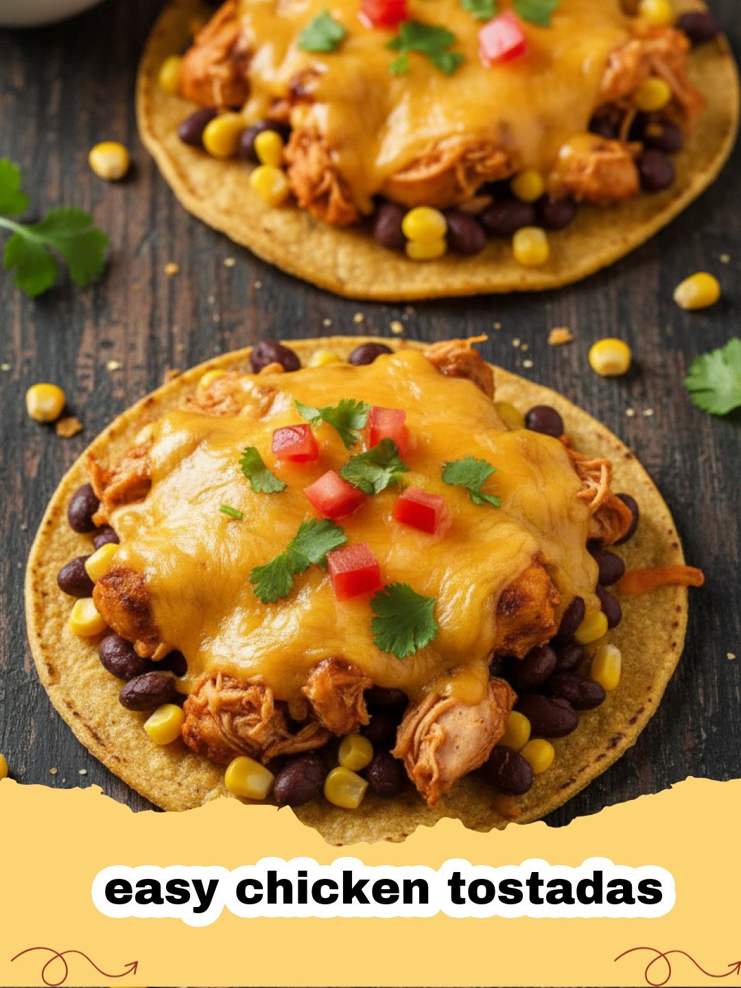 A plate of easy chicken tostadas topped with lettuce, cheese, and tomatoes.