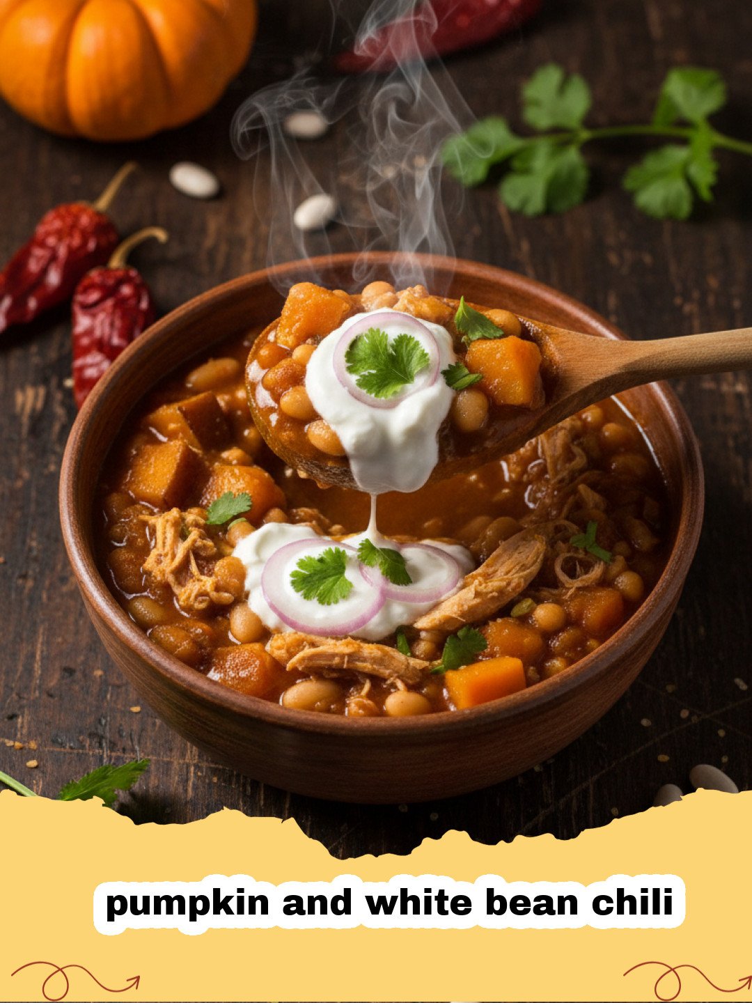 A steaming bowl of pumpkin and white bean chili topped with cilantro and avocado.