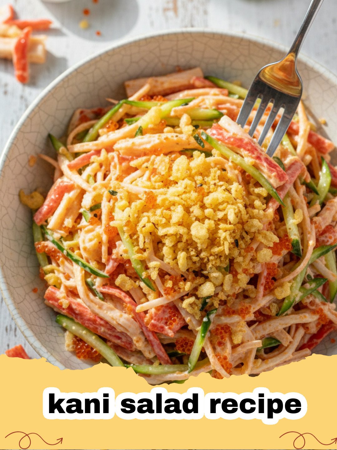 kani salad recipe - A close-up shot of creamy kani salad in a black bowl garnished with sesame seeds and cucumber strips.