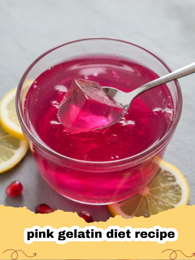 pink gelatin diet recipe - A close-up of a creamy pink gelatin dessert in a glass bowl with a fresh strawberry on top.