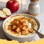 Baked Apple Cinnamon Cottage Cheese Bowls - A cozy bowl of Baked Apple Cinnamon Cottage Cheese with warm, spiced apples and creamy cottage cheese, topped with cinnamon and nuts.