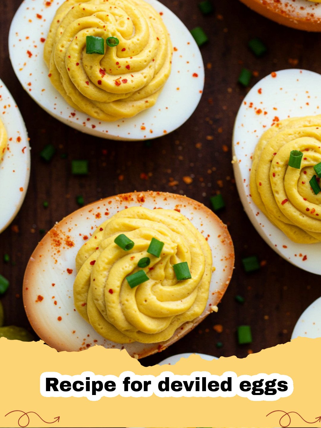 Recipe for deviled eggs - A platter of beautifully garnished deviled eggs with paprika and chives.