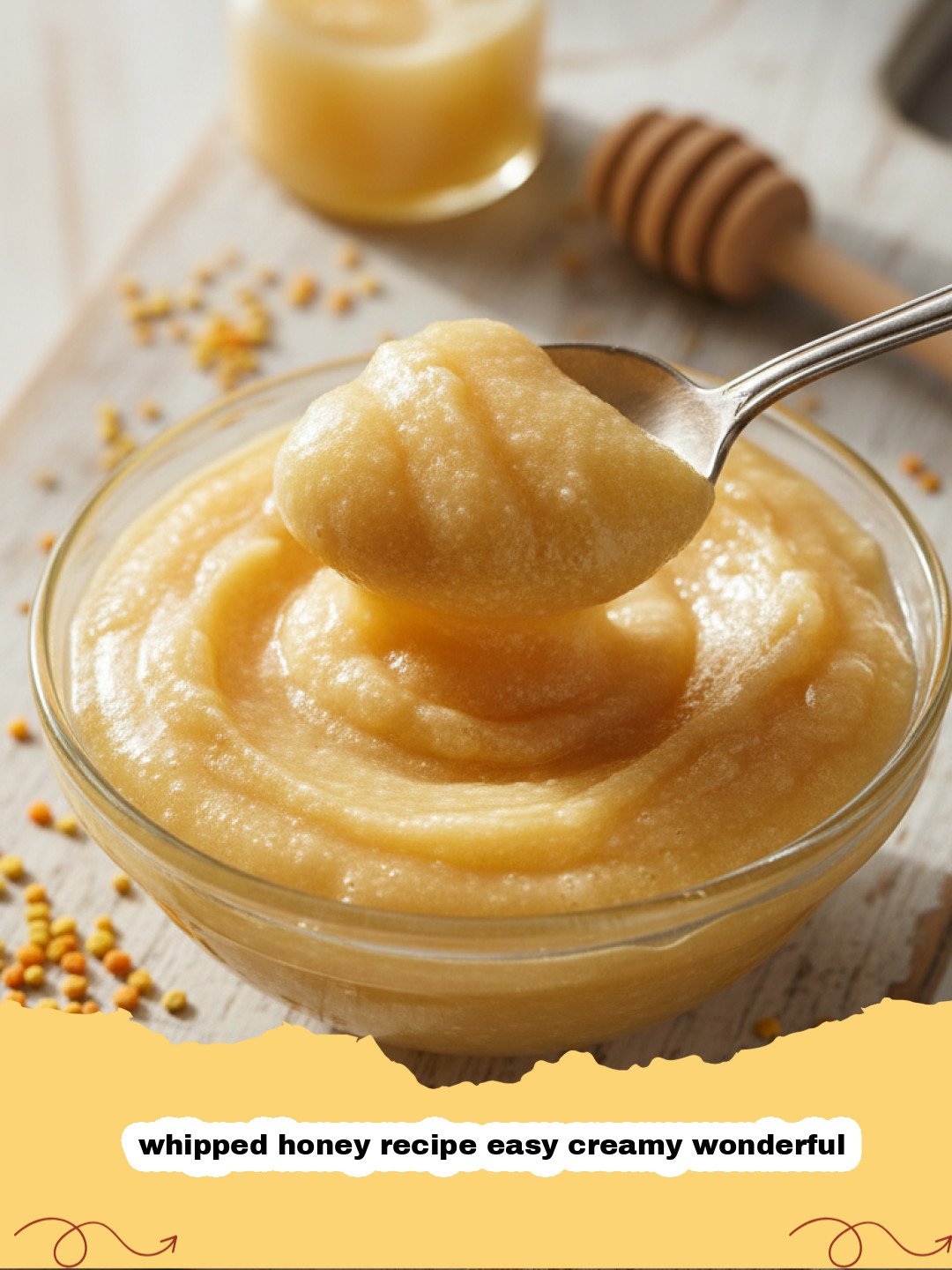 whipped honey recipe easy creamy wonderful - Close-up of fluffy, light beige whipped honey in a glass jar with a spoon, ready to be served.