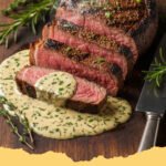 Herb Butter Steak Creamy Garlic Sauce - Perfectly seared Herb Butter Steak with creamy garlic sauce on a white plate, garnished with fresh herbs.