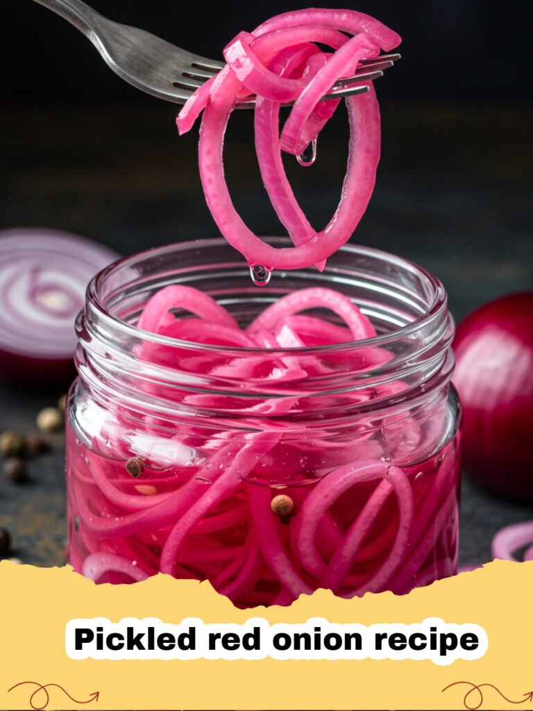 Pickled red onion recipe - A glass jar filled with bright pink pickled red onions.