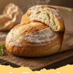 bread in a bag recipe - Freshly baked golden-brown bread loaf resting on a wire rack, steam gently rising, with a zip-top bag in the background