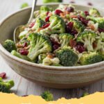cold broccoli salad recipes - A vibrant bowl of creamy cold broccoli salad with cranberries and sunflower seeds