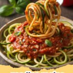 zoodles recipe - Plate of vibrant zoodles with sun-dried tomatoes and basil.