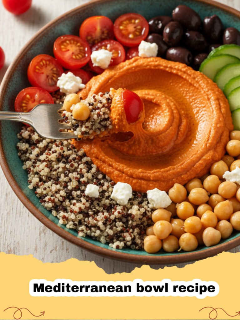 Mediterranean bowl recipe - A beautifully arranged Mediterranean bowl with quinoa, colorful vegetables, feta, and hummus.