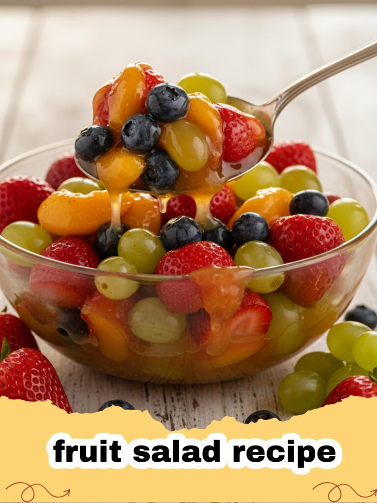 fruit salad recipe - A vibrant rainbow fruit salad in a clear glass bowl, glistening with a light honey-lime dressing and garnished with fresh mint. Perfect for a summer gathering.
