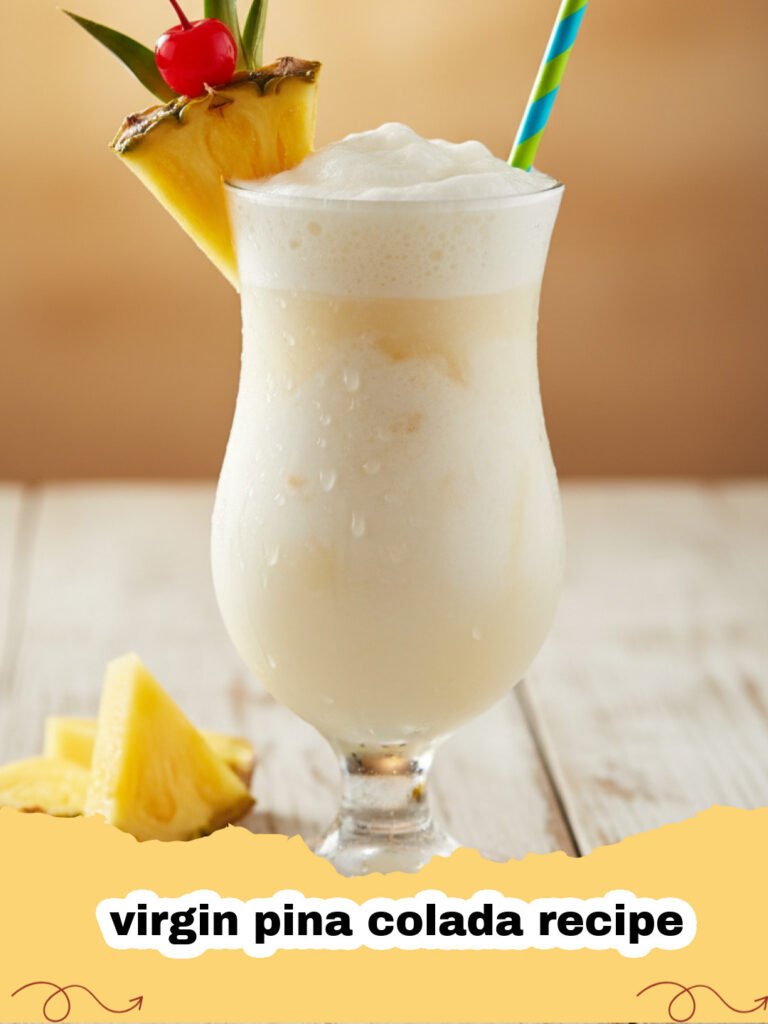 virgin pina colada recipe - A perfectly blended virgin pina colada served in a hurricane glass, garnished with a pineapple wedge and a cherry, against a blurred tropical background.