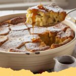 french toast recipe casserole - Close-up of golden-brown French Toast Casserole with streusel topping and powdered sugar.