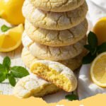 summer cookie recipes - Pile of Zesty Lemon Blueberry Cookies on a cooling rack with fresh lemons and blueberries nearby.