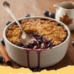 healthy blueberry recipes - A plate of healthy blueberry lemon oat bars with fresh berries on the side.