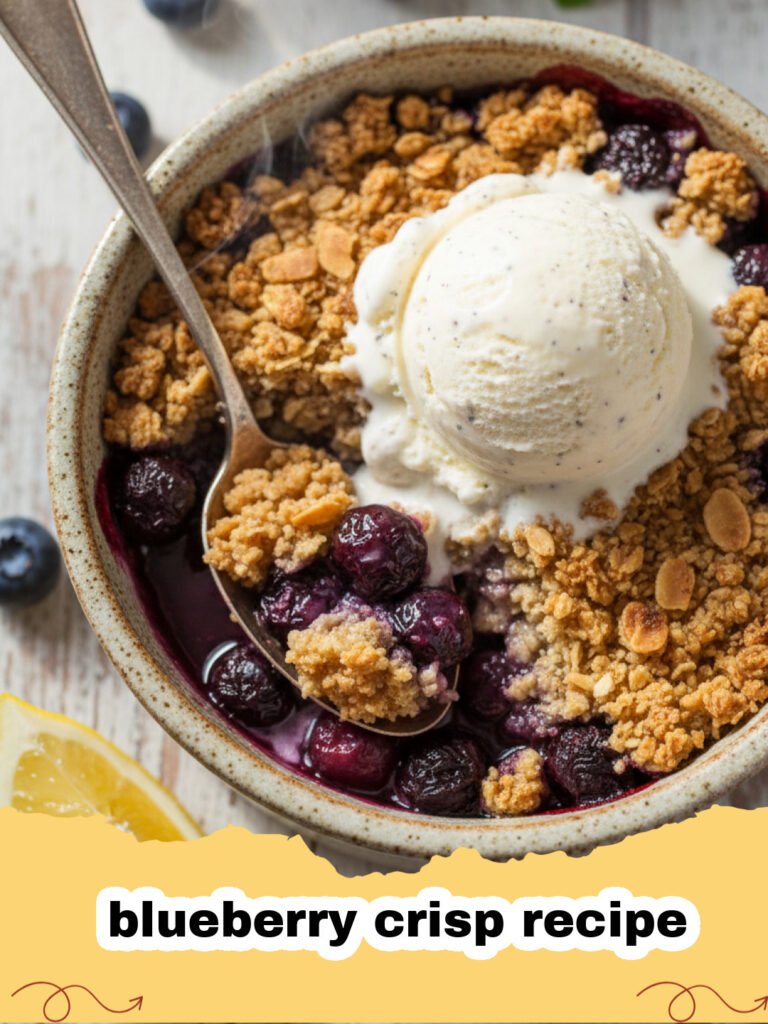 blueberry crisp recipe - A warm, golden-brown blueberry crisp in a baking dish, served with a scoop of vanilla ice cream.