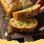 garlic bread recipe - Golden brown cheesy garlic bread slices on a wooden board, garnished with fresh parsley.