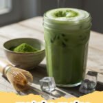 matcha recipe - A vibrant green matcha latte in a clear glass mug with froth on top.