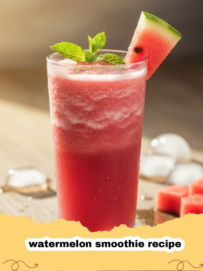 watermelon smoothie recipe - Close-up of a vibrant red watermelon smoothie in a glass with a lime wedge and mint sprig.