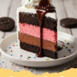ice cream cake recipe - A beautifully layered homemade ice cream cake with chocolate and vanilla ice cream, Oreo crust, hot fudge, caramel, and whipped topping.