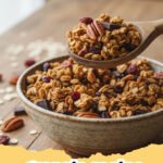 Homemade granola in a bowl with berries and yogurt, representing a delicious granola recipe.