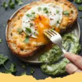 Cheesy Egg Toast with Coriander-Yogurt Chutney - Golden Cheesy Egg Toast with a side of vibrant green Coriander-Yogurt Chutney, garnished with fresh cilantro