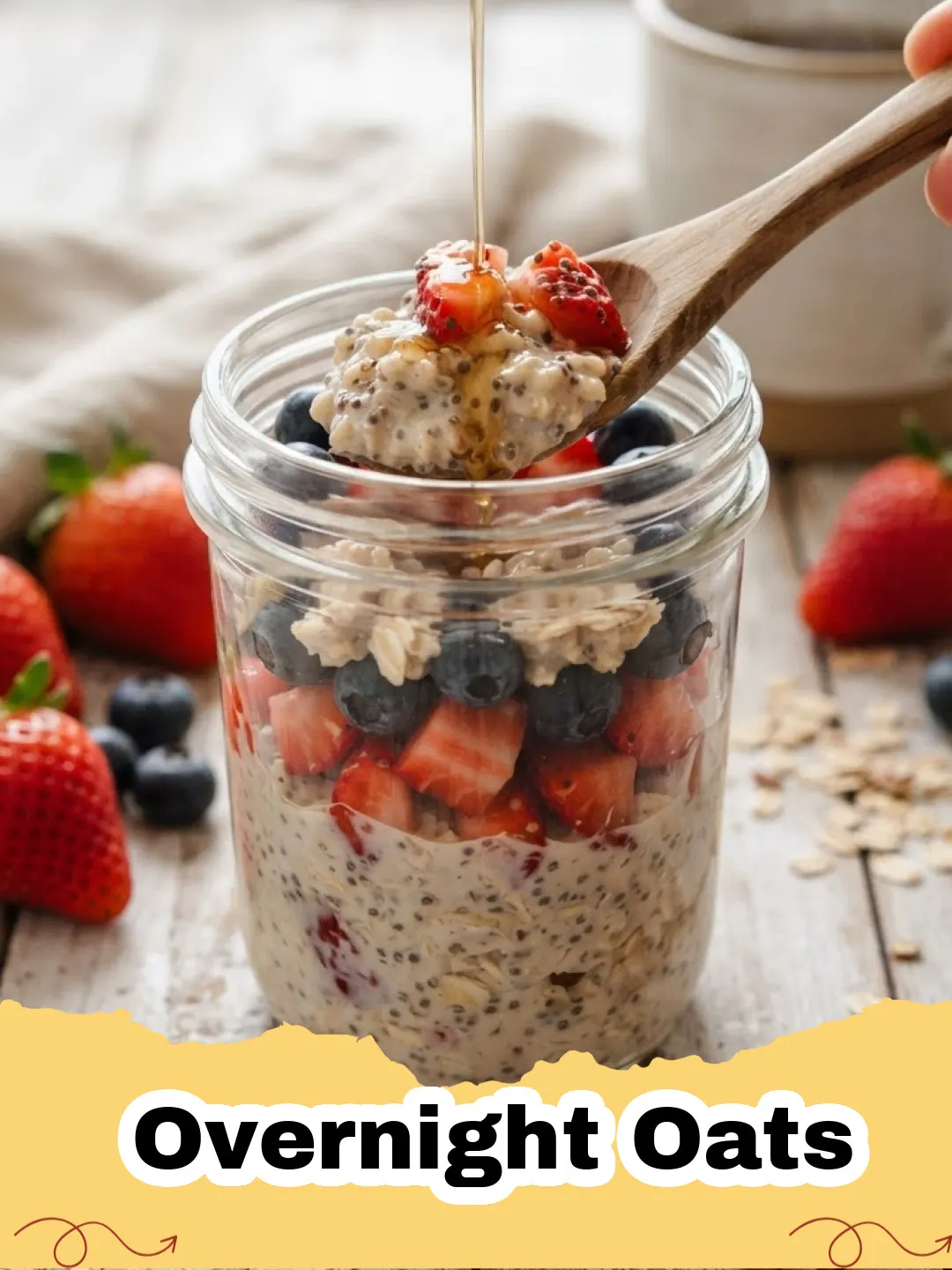Overnight Oats - Jar of classic vanilla overnight oats topped with fresh berries and a spoon.