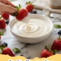 fruit dip recipe - A creamy fruit dip in a white bowl surrounded by fresh berries, sliced kiwi, and apple slices, ready for dipping.