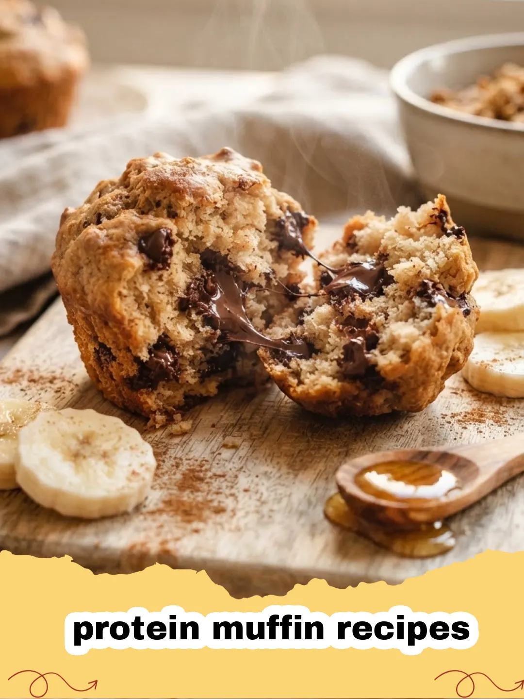 protein muffin recipes - Close-up of a stack of freshly baked banana chocolate chip protein muffins on a cooling rack.