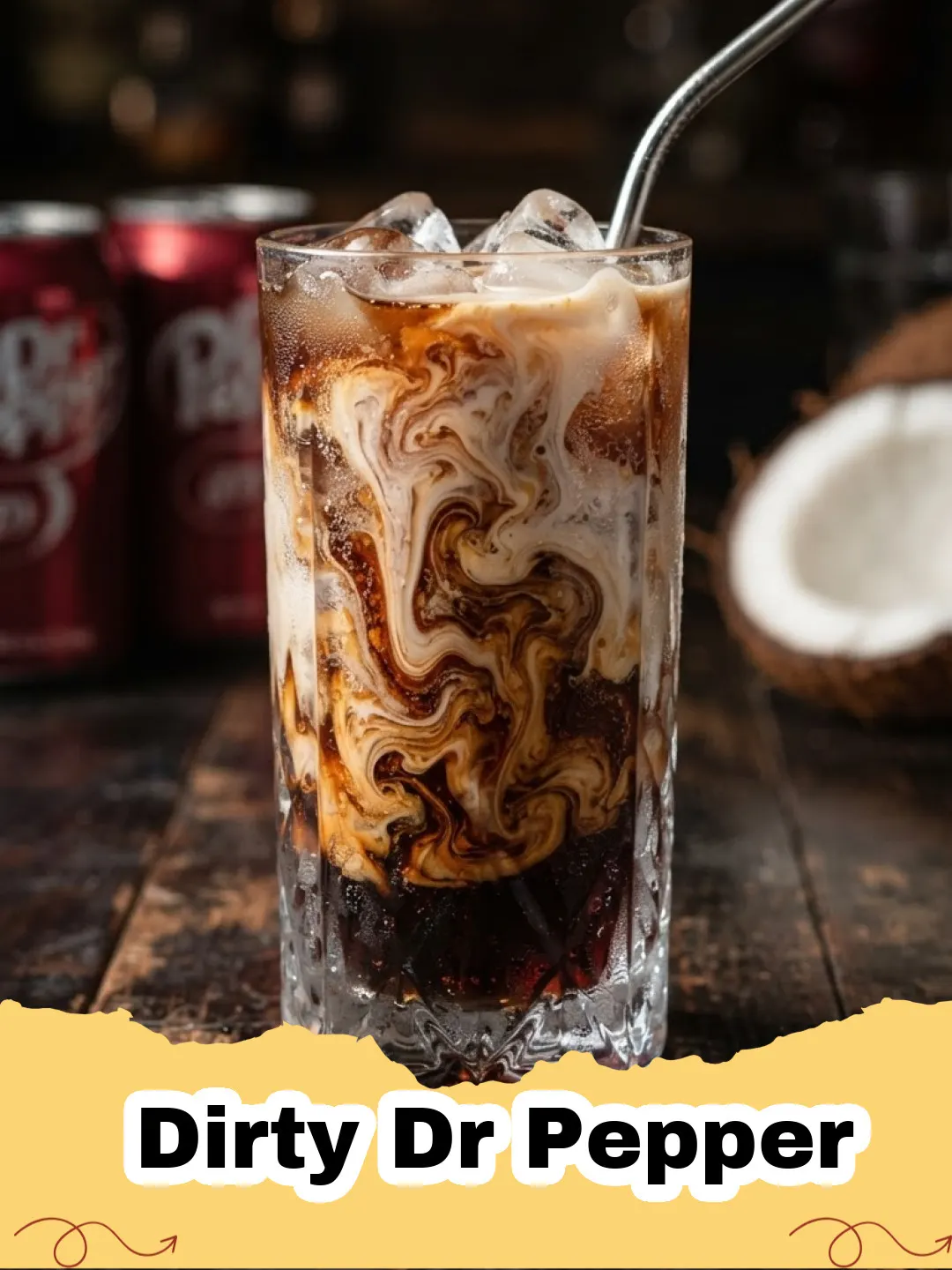 A refreshing Dirty Dr Pepper in a clear glass with ice, a lime wedge, and a straw.