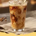 nescafe gold espresso recipe - A perfectly prepared cup of Nescafe Gold Espresso with golden-brown crema, steaming gently.