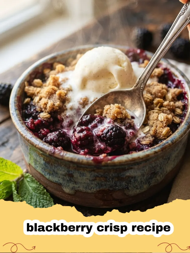 A warm, bubbly classic blackberry crisp recipe in a white baking dish, topped with a scoop of melting vanilla ice cream.