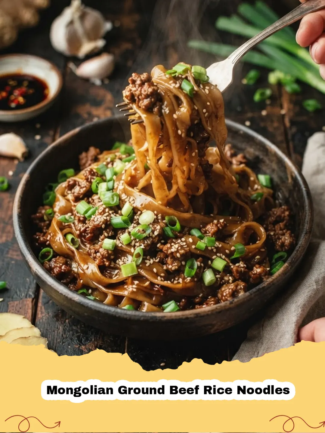 A close-up shot of Mongolian Ground Beef Rice Noodles in a large skillet, garnished with green onions and sesame seeds.